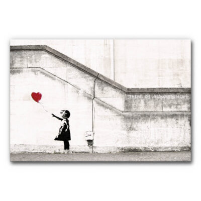 Akustikbild The Girl With The Balloon (Banksy) - Urban, plakativ, ikonisch. Schwarz-weiße Banksy-Silhouette eines Mädchens, das sehnsüchtig einem roten, herzförmigen Ballon nachblickt. Klare Komposition auf rauer Betonwand, durch das kräftige Rot des Ballons und den Schrifzug "There is always hope" emotional aufgeladen. Minimalistische Szene mit starker Symbolik – ideal für moderne Räume, die Kunst und Botschaft verbinden möchten.